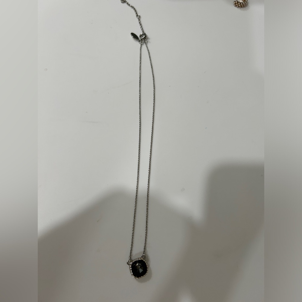Black jewel and silver necklace